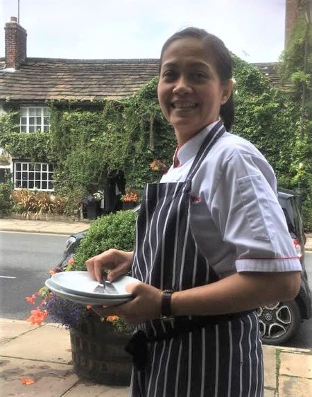 Chef Tan speaking with diners